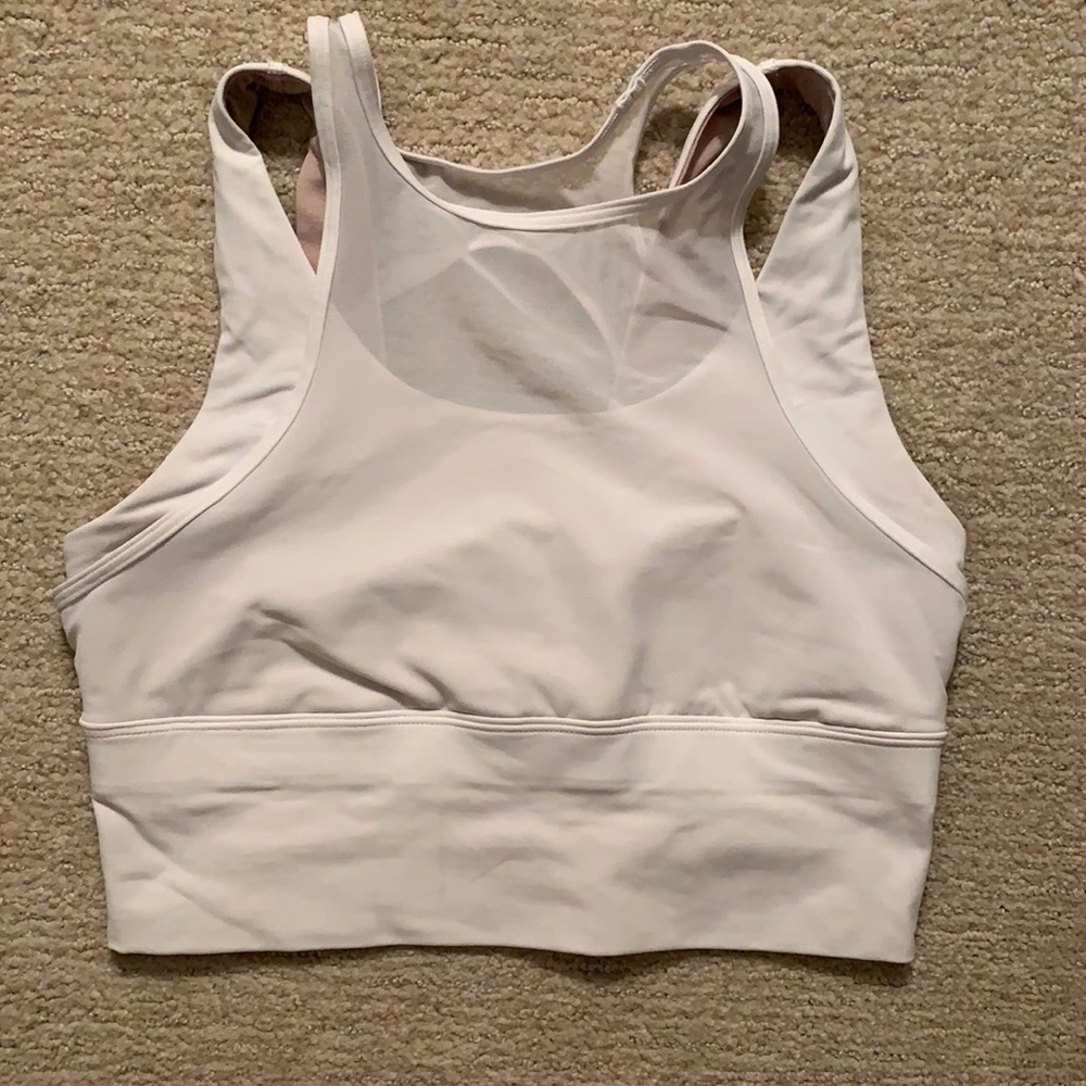 Lululemon crop tank and white with mesh neck line.